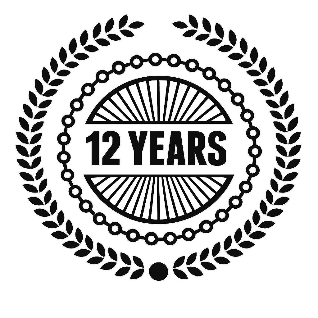 Black and white emblem with "12 YEARS" in bold letters, surrounded by a circular laurel wreath and decorative rays, representing a twelve-year anniversary or milestone.